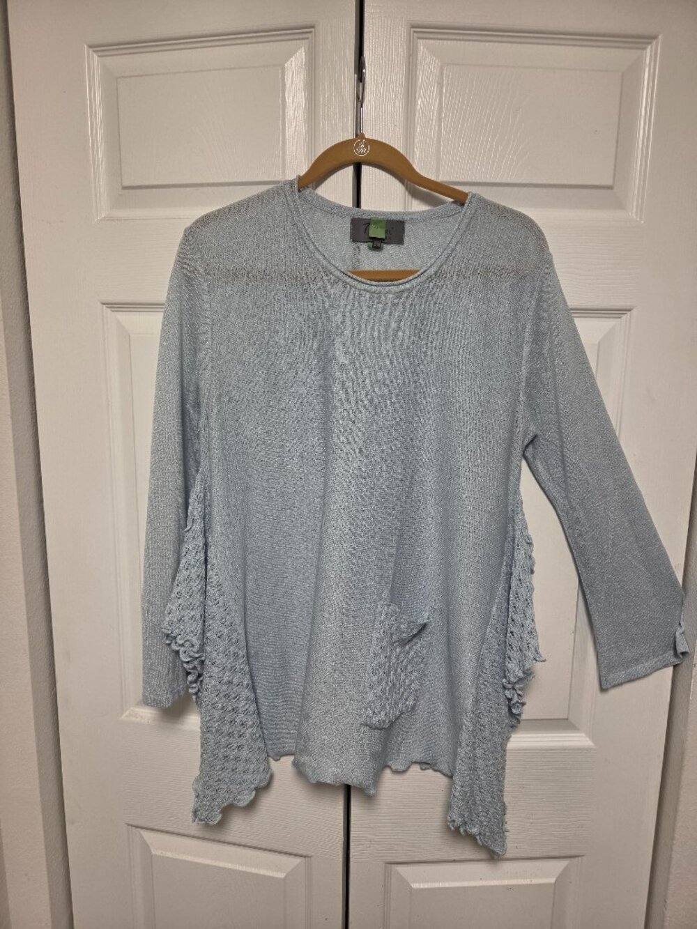 Very different light blue top with unique detailing